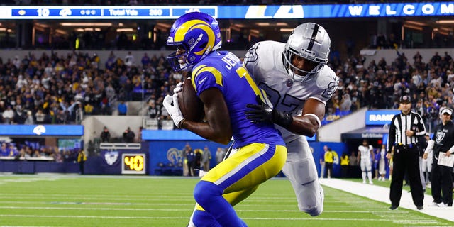 Van Jefferson #12 of the Los Angeles Rams catches the game winning touchdown against Sam Webb #27 of the Las Vegas Raiders during the fourth quarter at SoFi Stadium on December 08, 2022 in Inglewood, California.