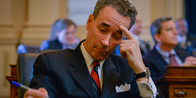 Joseph D. Morrissey prepares for business to begin as lawmakers return to Richmond to kick off the 2015 Virginia General Assembly on Wednesday, Jan. 14, 2015, in Richmond, Virginia.