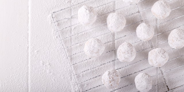 This recipe for snowball cookies yields 48 cookies.