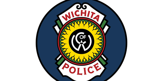 Roark was arrested by Wichita Police as he attempted to leave the house.