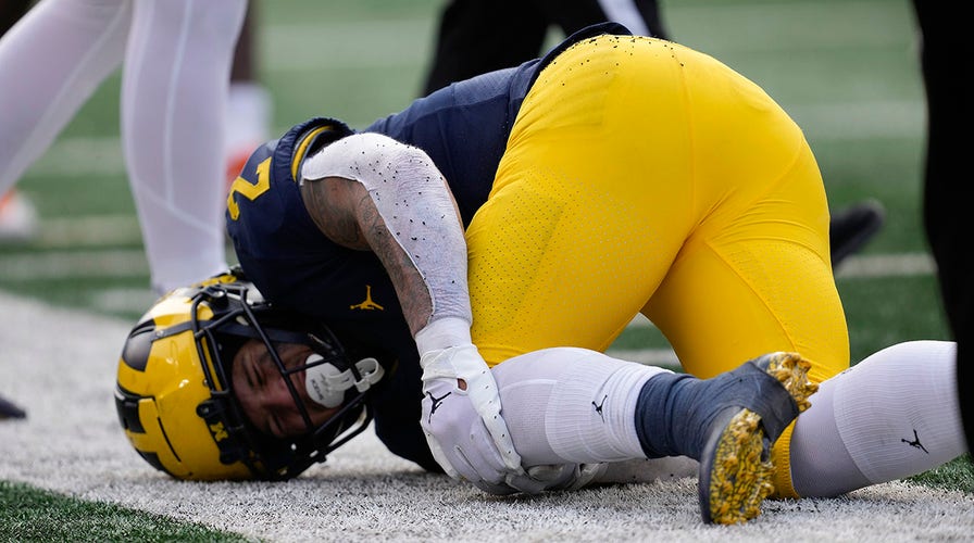 No. 2 Michigan s Heisman hopeful out for season to undergo knee