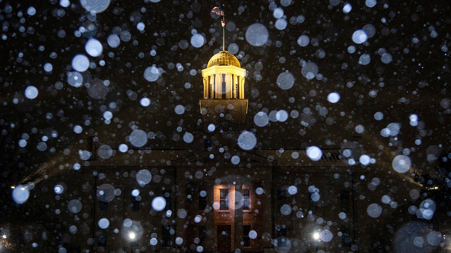 Snow falling at Old Capitol Building in Iowa City, Iowa.