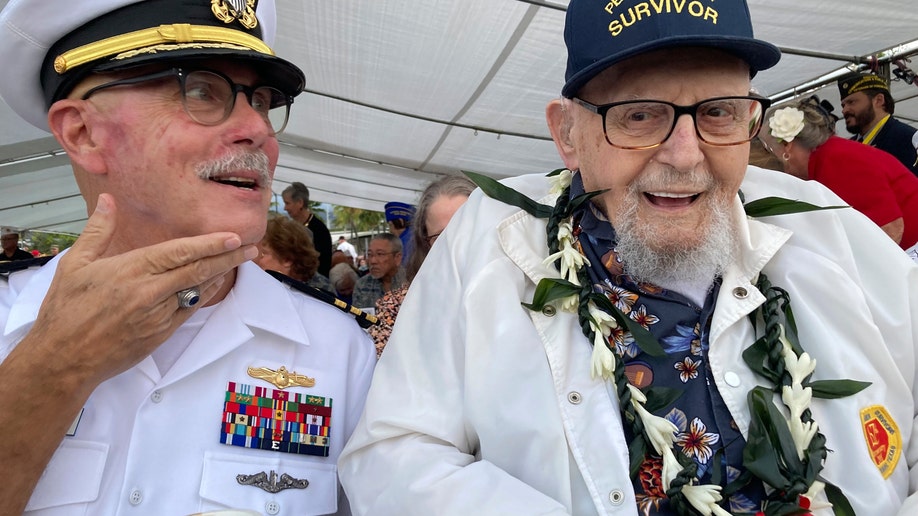 Pearl Harbor veteran Ira Schab and his son, retired Navy Cmbr. Karl Schab
