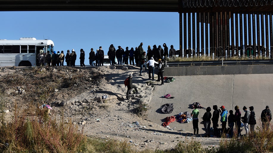 Migrants crossing the border