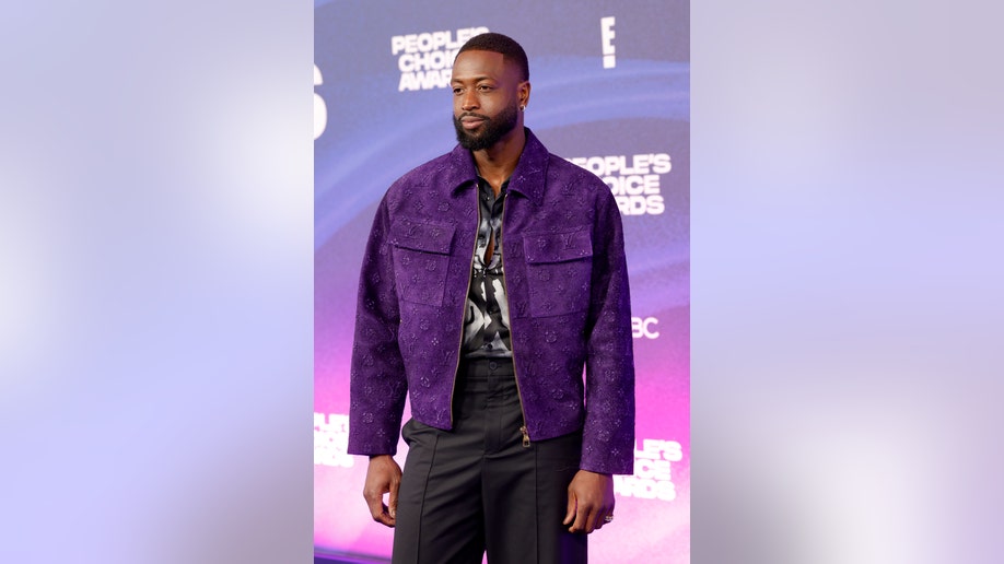 Dwyane Wade makes fashion statement in purple and black leather on People's Choice red carpet