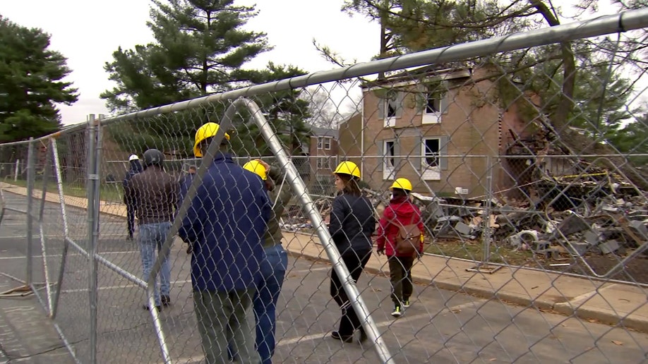 People visit the site of a Maryland condo explosion