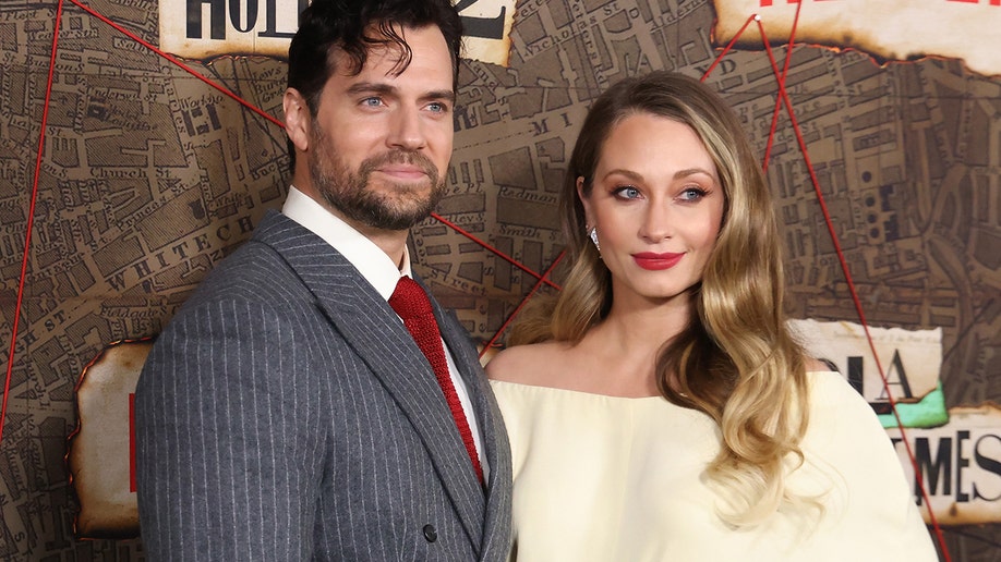 Henry Cavill and Natalie Viscuso at a premiere