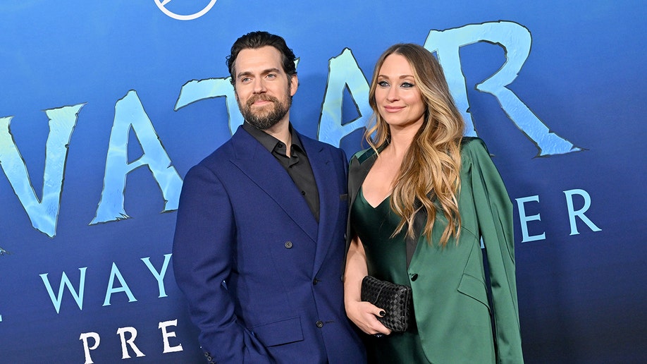 Henry Cavill, left, and Natalie Viscuso arrive at the U.S.premiere