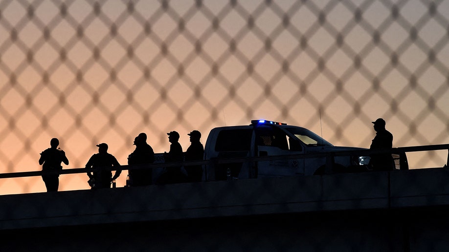 Border security at dusk