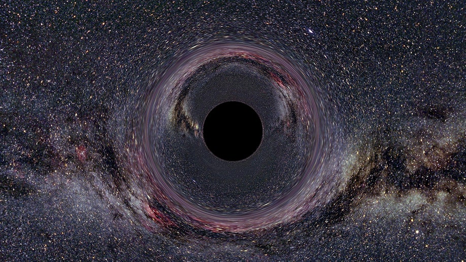 A dark photo of a black hole
