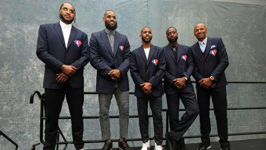 Lebron James with his friend Dwayne Wade, Carmelo, and Chris Paul at NBA 75 ceremony
