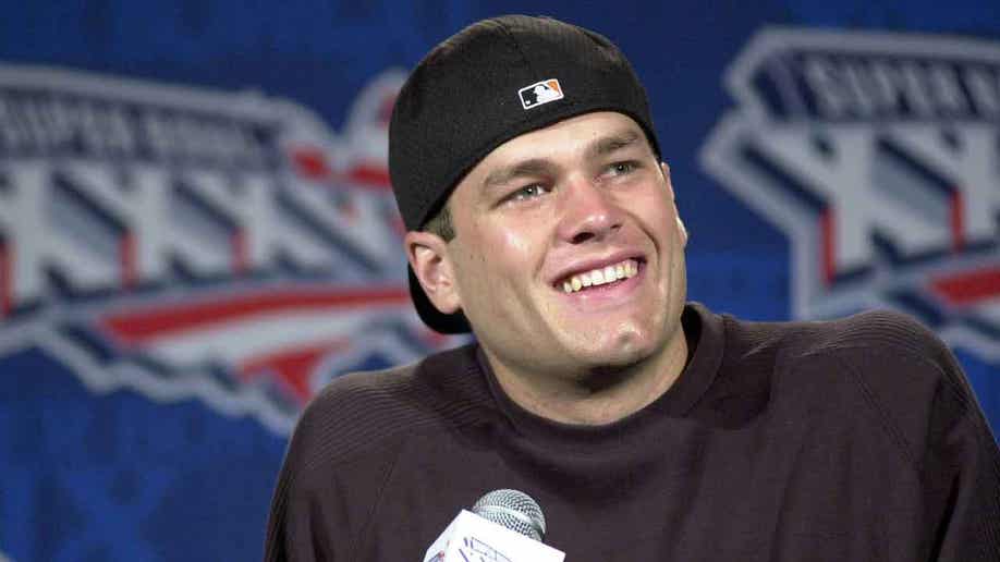 Tom Brady at a press conference in 2001