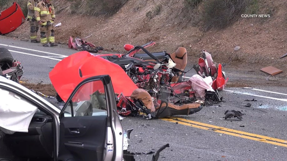 Ferrari in pieces on road