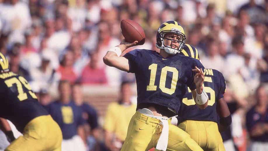 Brady playing in college at Michigan