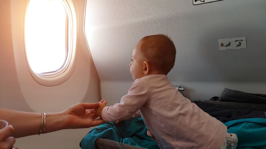 Airplane traveler asks couple to stop changing their baby's diaper on the seat's tray table: 'No idea'