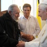 Fidel Castro shakes hands with Pope Benedict