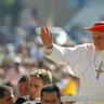Pope Benedict in red hat waving