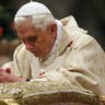 Pope Benedict kneels in prayer