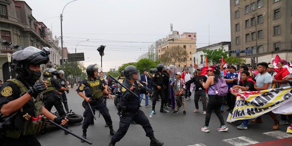 Police, protesters in Peru's capital clash as demands for president's resignation grow