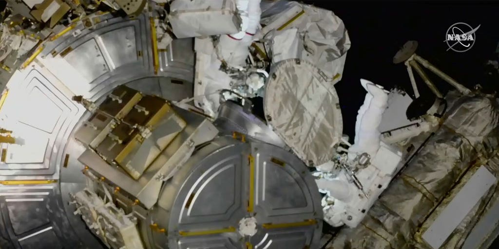 First Native American woman in space steps out on spacewalk
