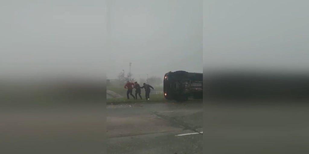 Houston UPS driver rescued after truck topples onto side during powerful tornado that ripped through region