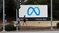 MENLO PARK, CA - DECEMBER 29: Visitors walk in front of the Meta (Facebook) sign at its headquarters in Menlo Park, California, United States on December 29, 2022.