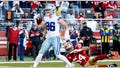 Dalton Schultz #86 of the Dallas Cowboys scores a touchdown against the San Francisco 49ers during the second quarter in the NFC Divisional Playoff game at Levi's Stadium on January 22, 2023 in Santa Clara, California.