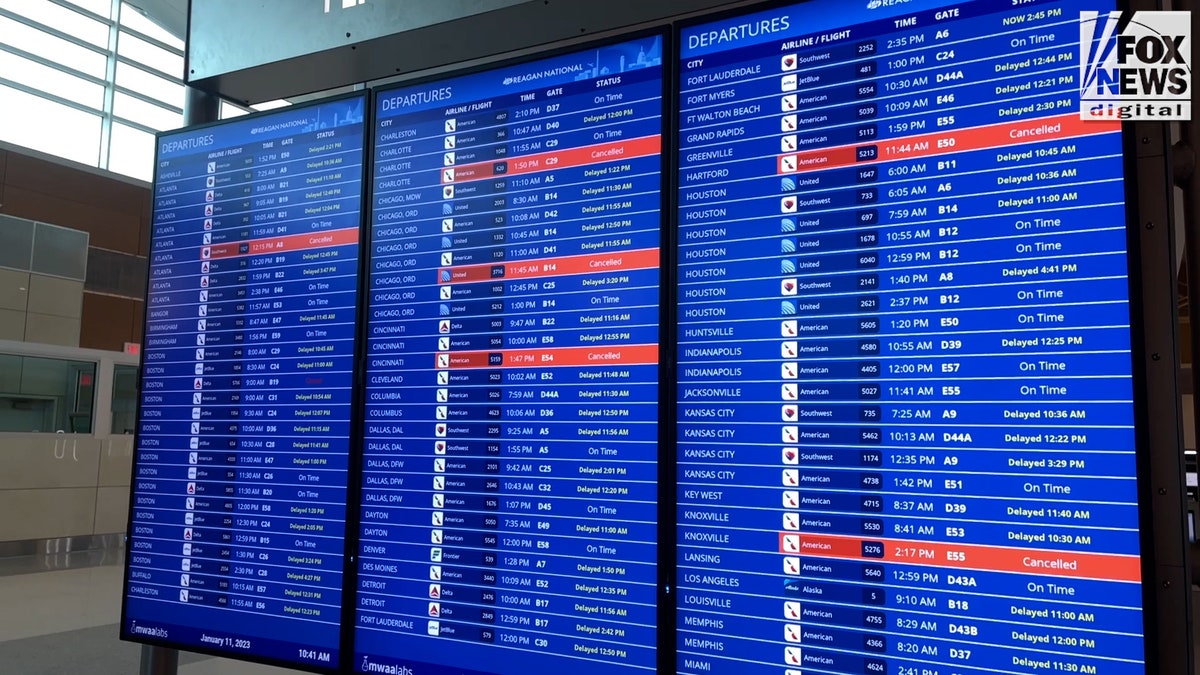 Flight board showing cancellations