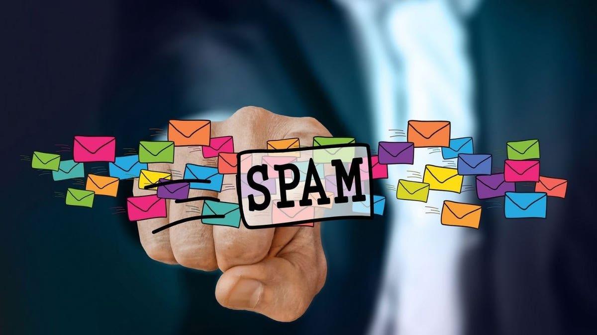 Graphic of a person pointing toward the camera with the word "spam"