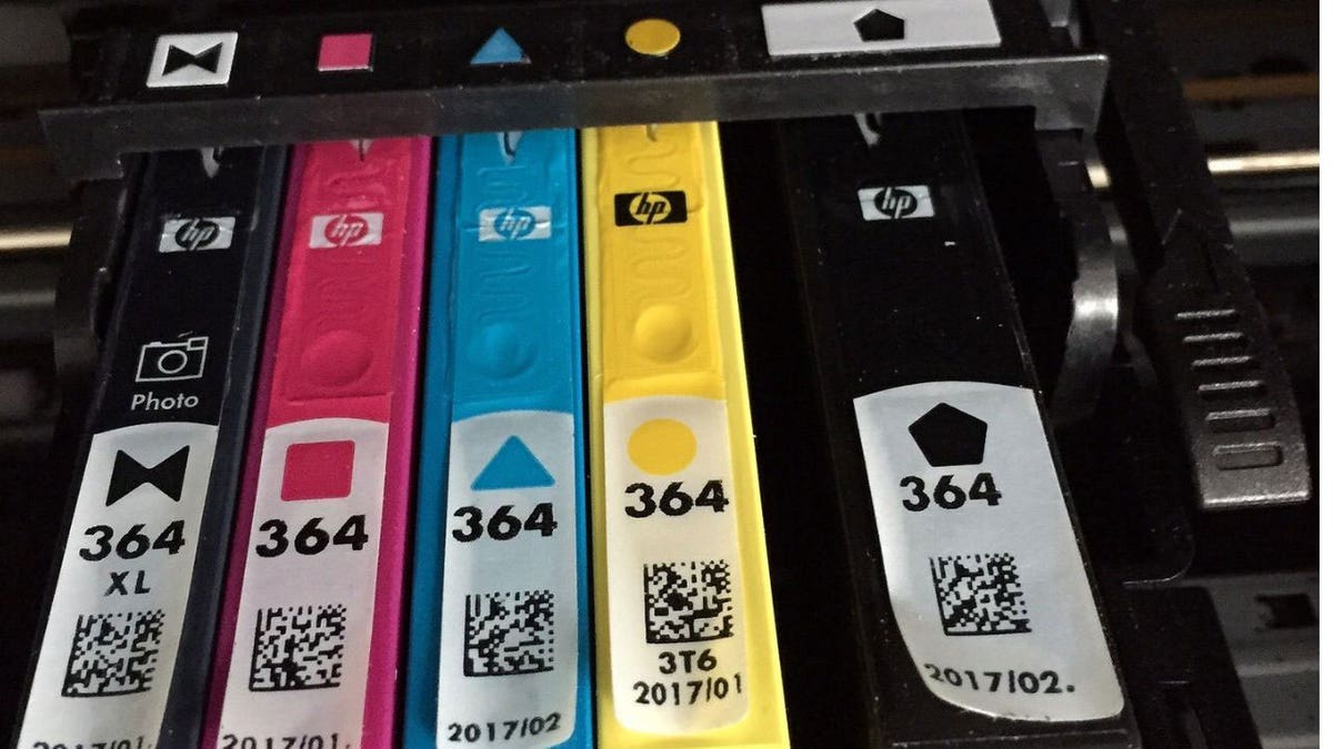 Printer ink cartridges in a printer.