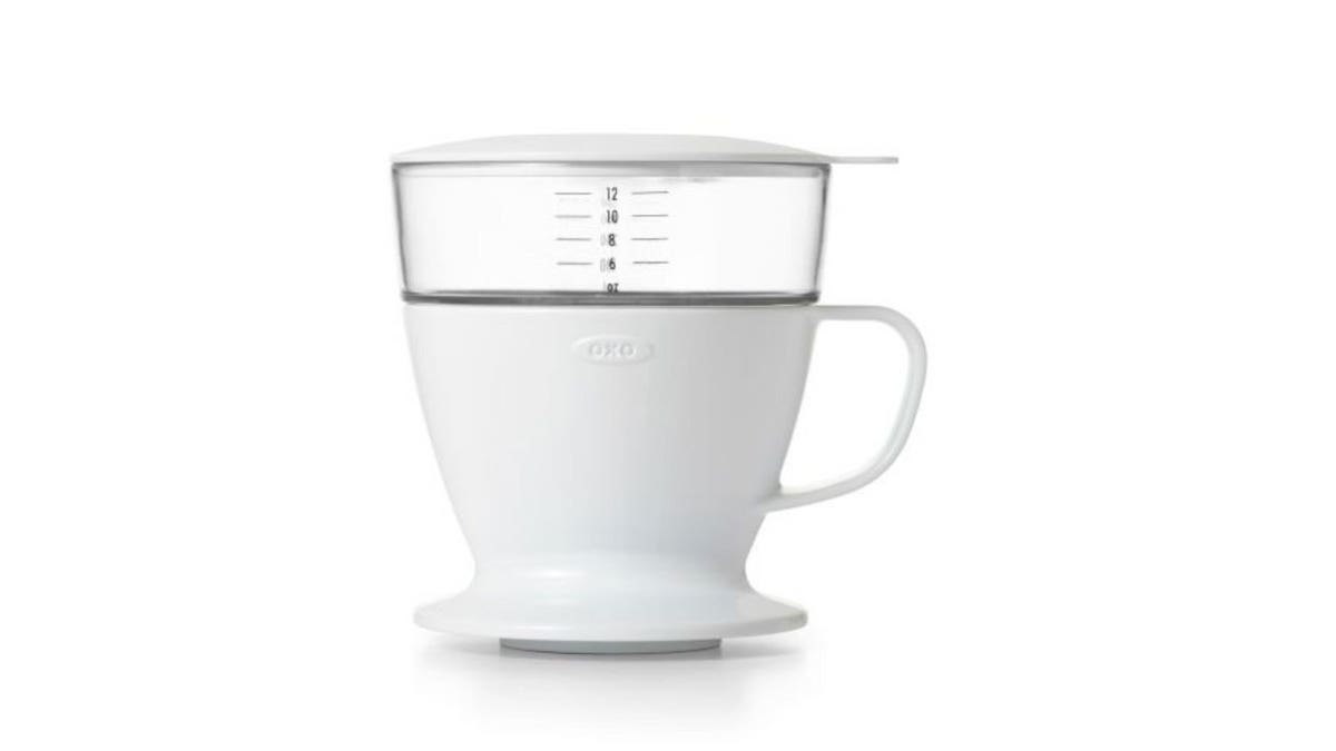 Photo of a white coffee maker.
