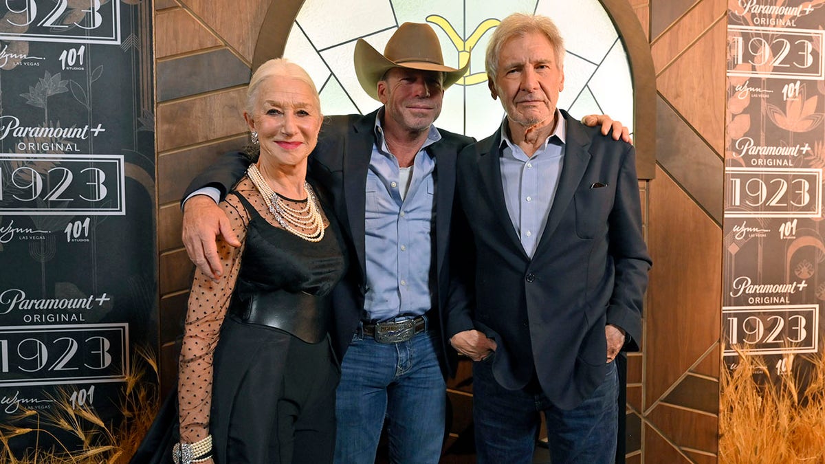 Helen Mirren, Taylor Sheridan and Harrison Ford smiling