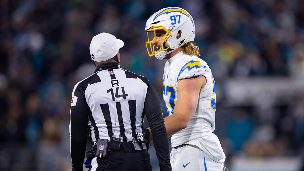 Joey Bosa talks with an NFL referee