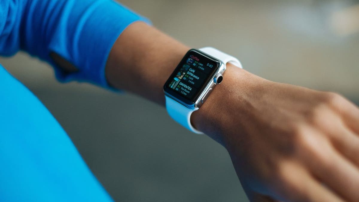 Woman wearing an Apple Watch