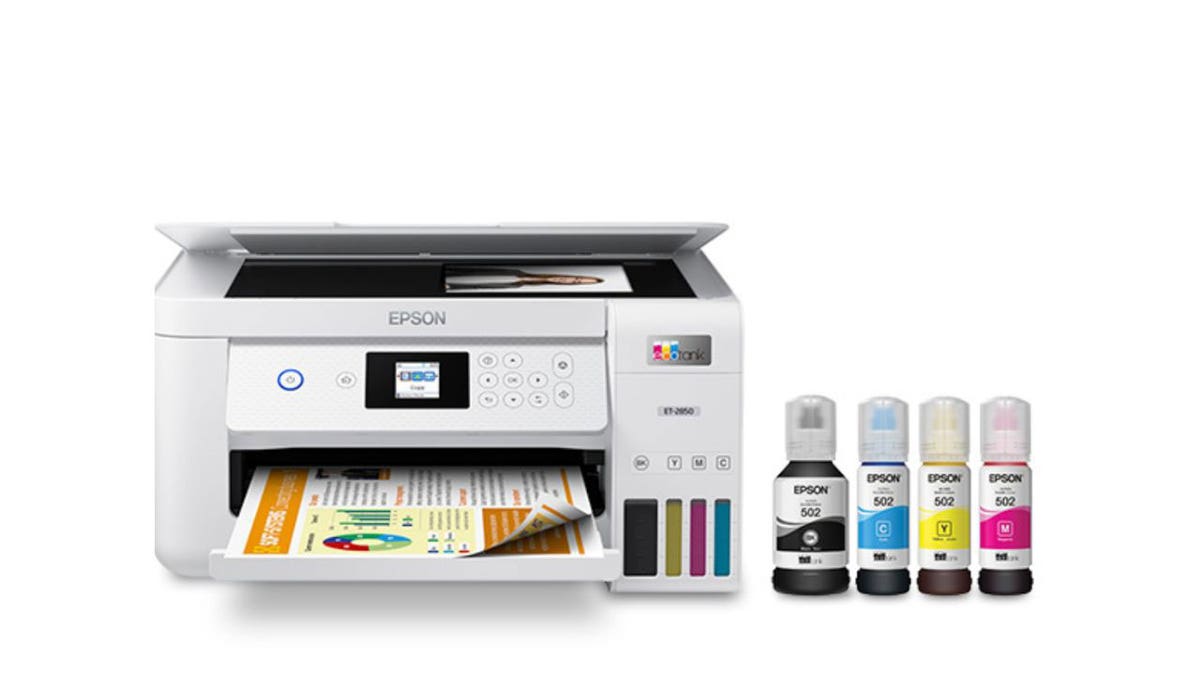 Epson printer with ink bottles on the side.