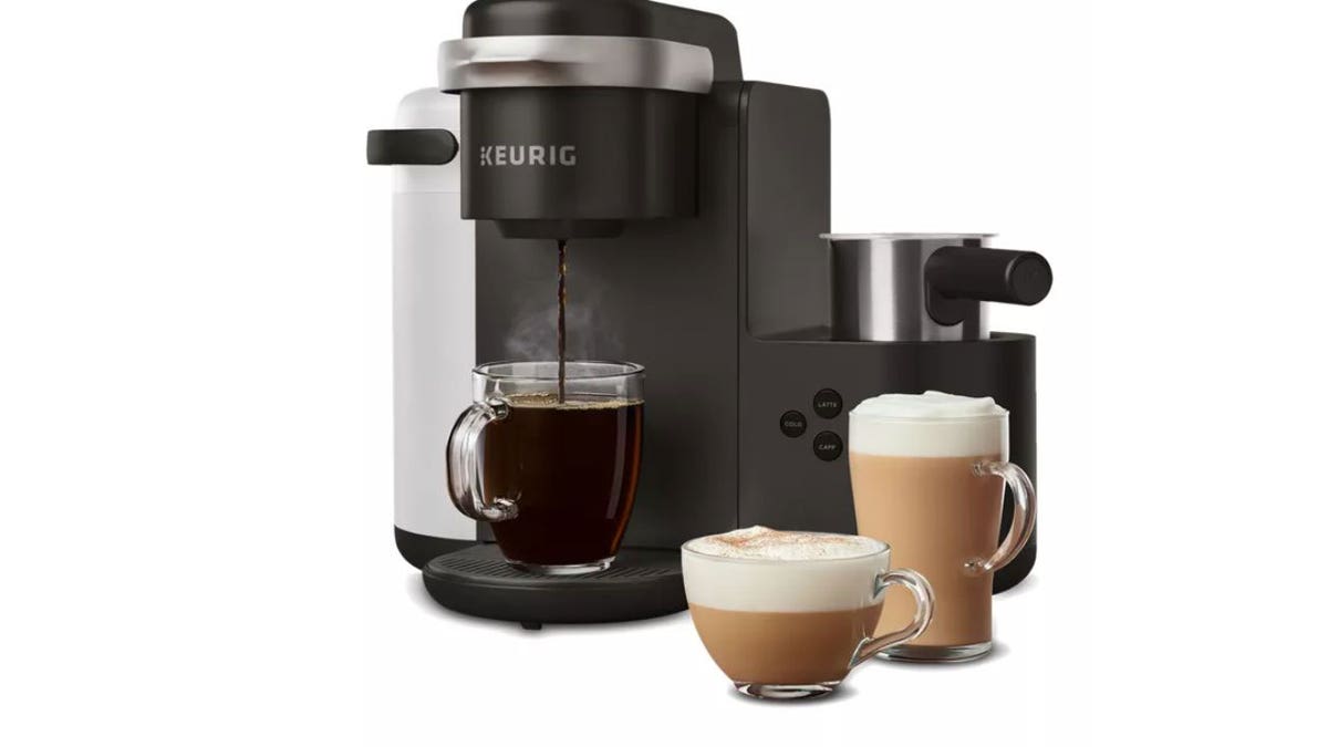 Photo of a Keurig coffee maker pouring coffee.