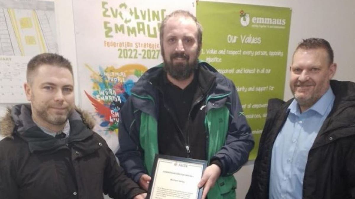 Homeless man Michael Ashby receiving award