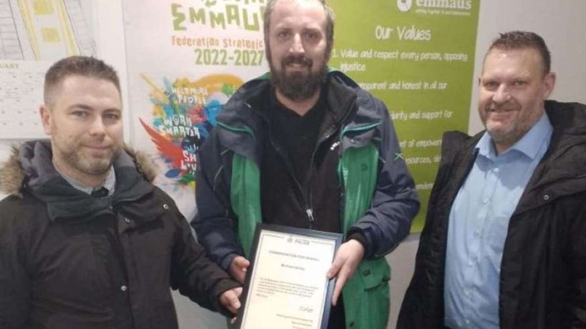 Homeless man Michael Ashby receiving award