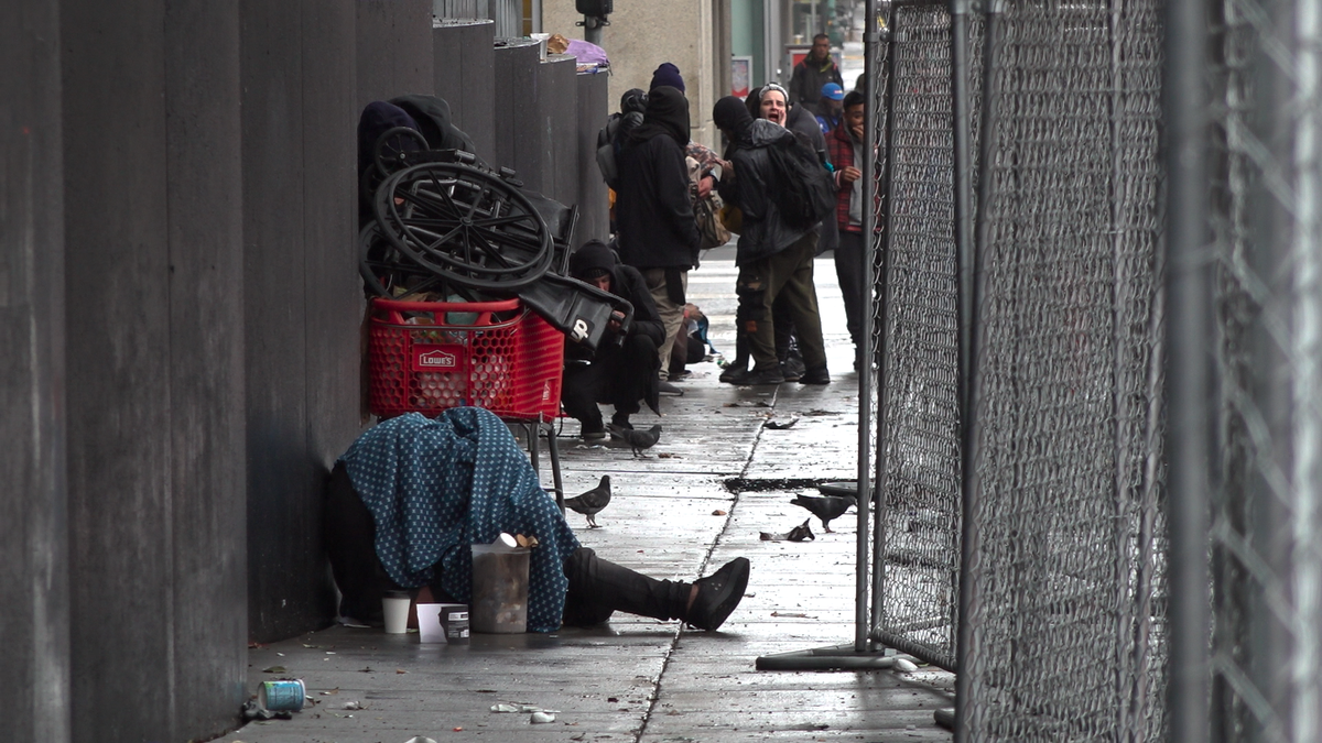 Drug users and dealers occupy a street corner in San Francisco