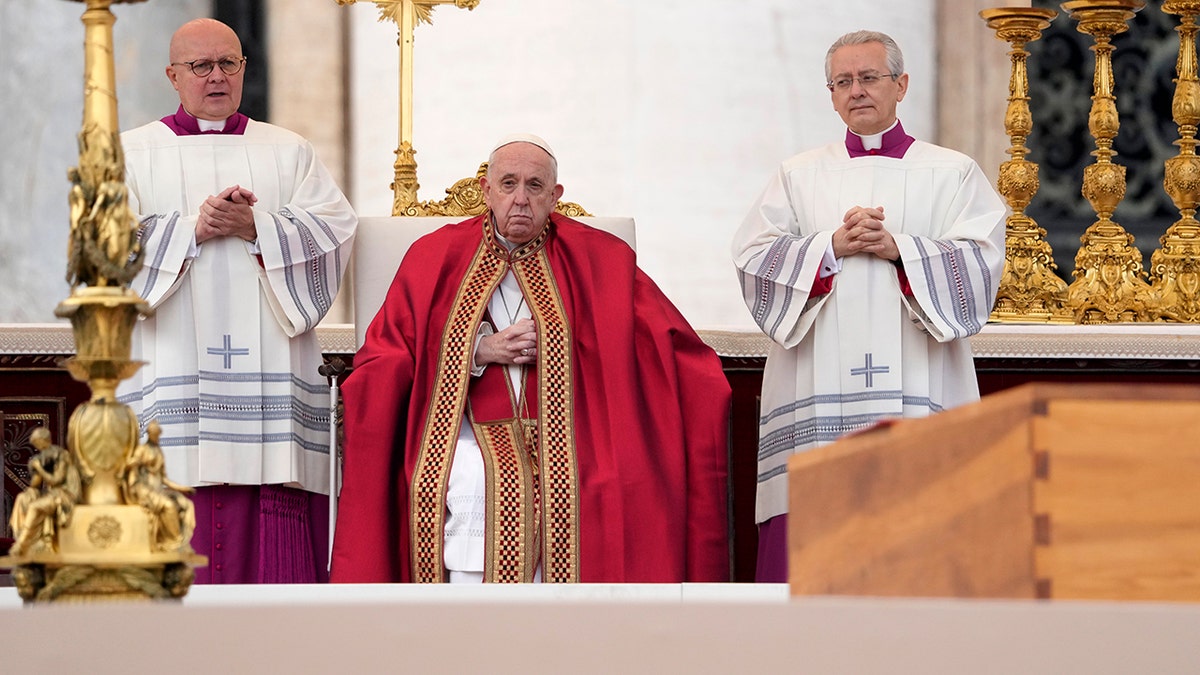 Pope Francis sitting