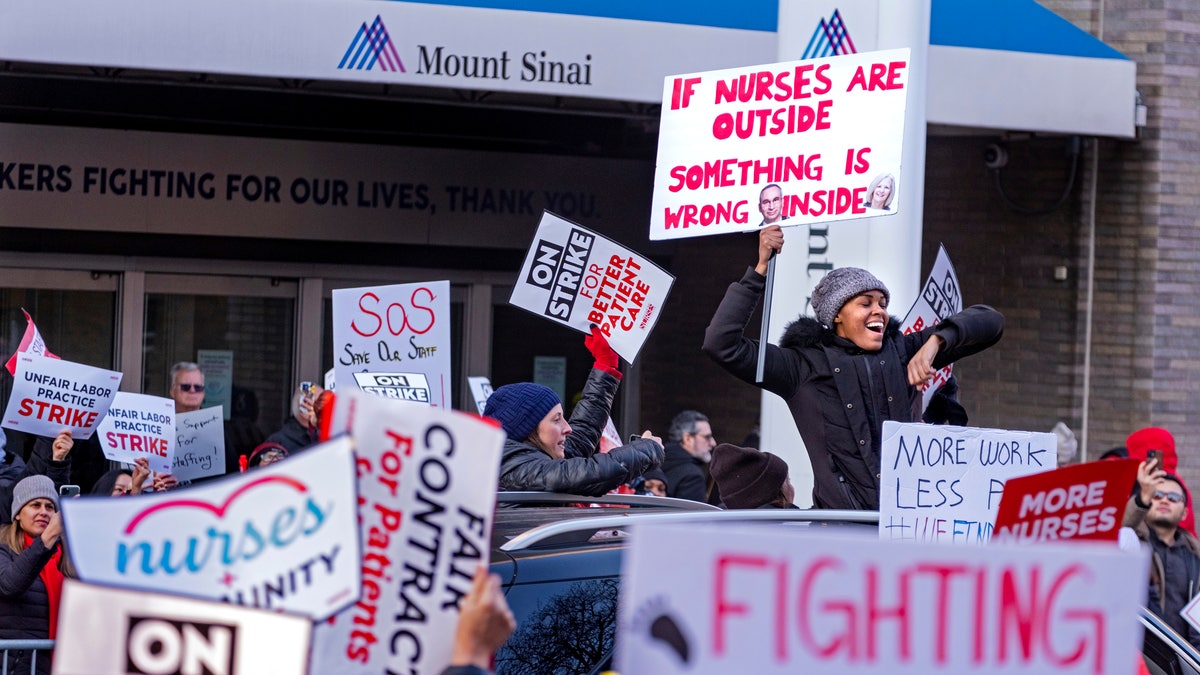 NYC nurse protest signs