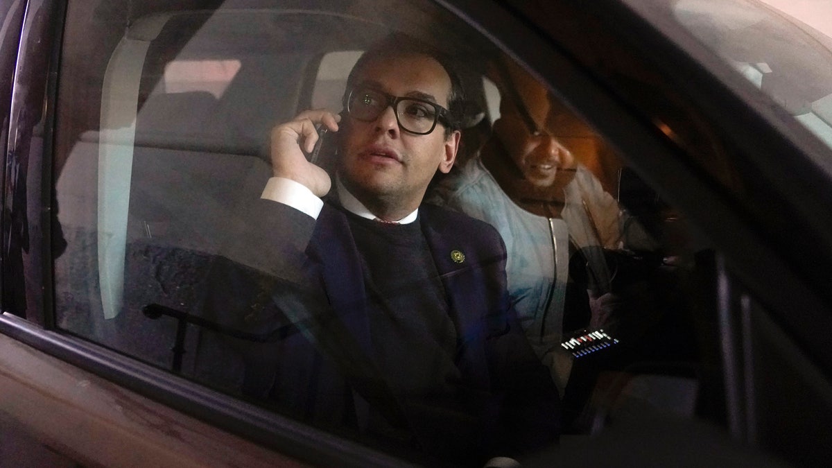 George Santos takes call in a car
