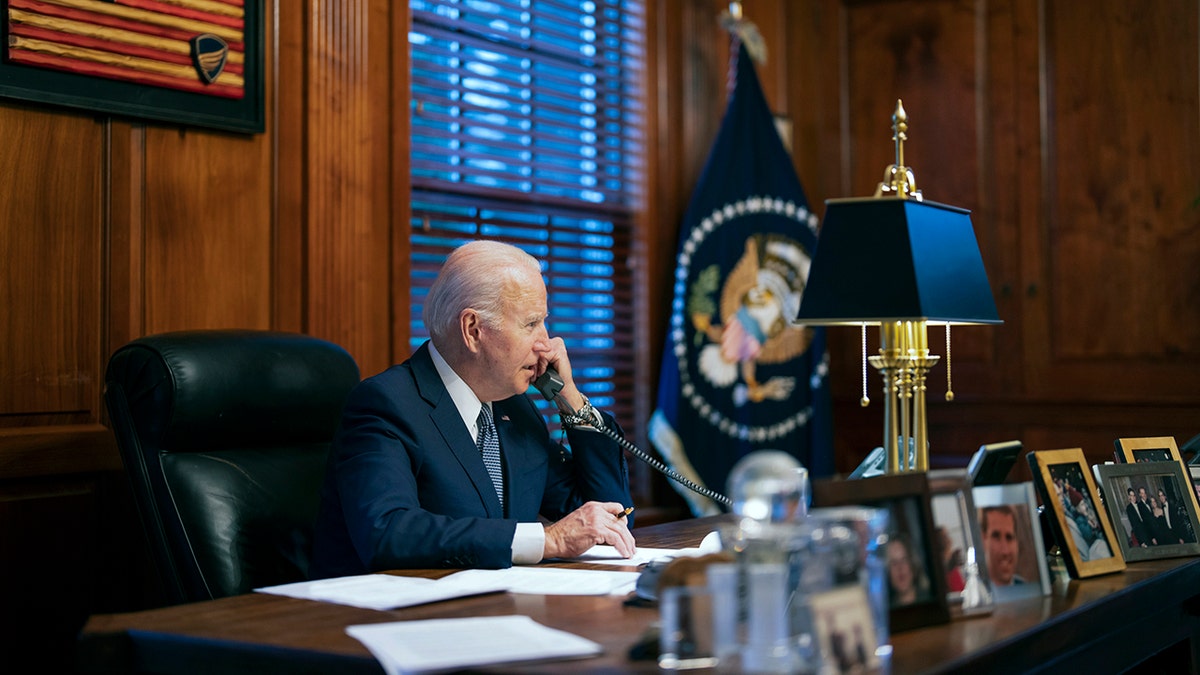 Joe Biden at a desk