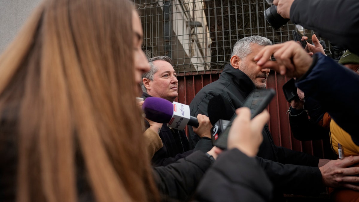 John Gimbel escaping reporters