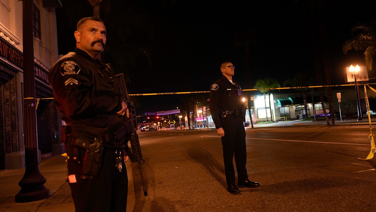 Two police officers standing