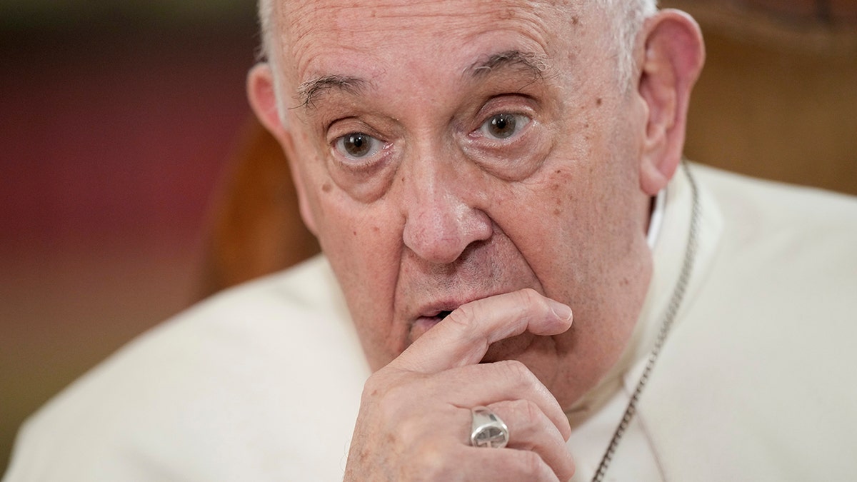 Pope Francis sitting for an interview