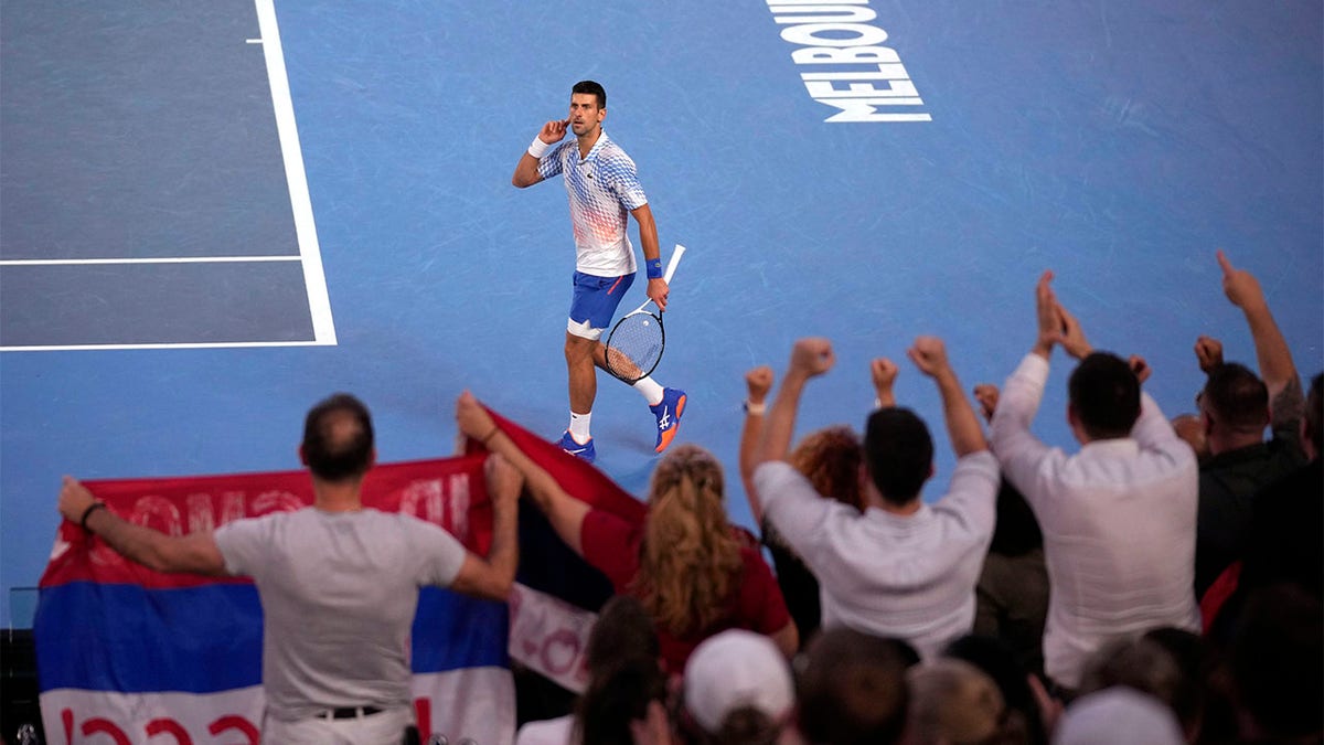 Novak Djokovi reacts after winning the first set