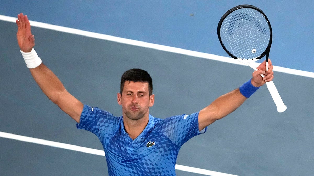 Novak Djokovic celebrates after winning the Australian Open semifinal