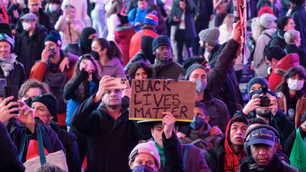 NYC Tyre Nichols protester holds "Black Lives Matter" sign
