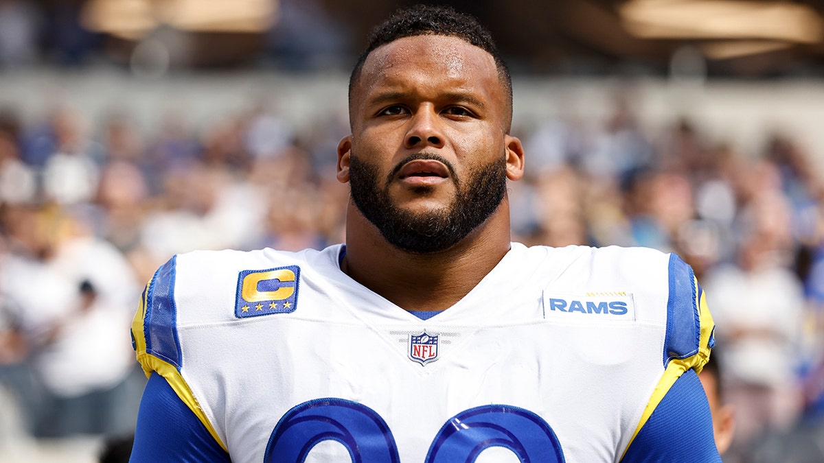 Aaron Donald listens to the national anthem